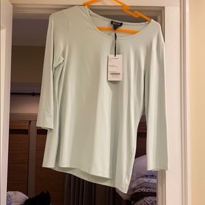 Worth designer from New York.  Mint green casual